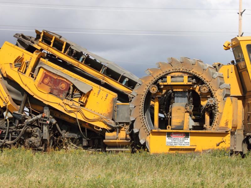 Closeup of Loram ballast cleaner in Winnipeg