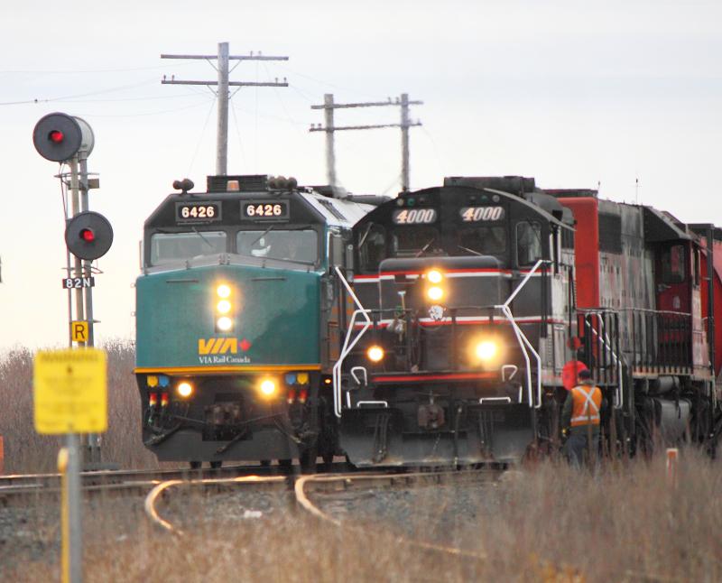 CEMR 4000 and VIA 6426 meet at Carman Junction