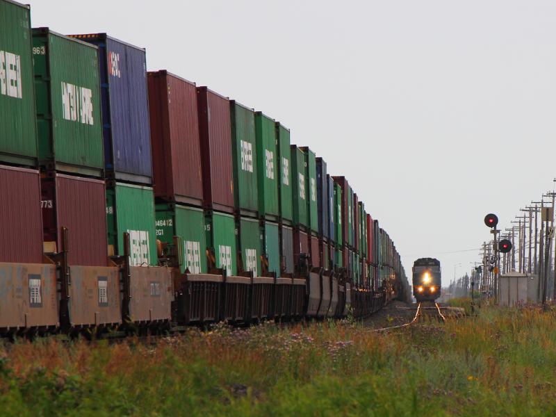 VIA 6413 passes a CN train