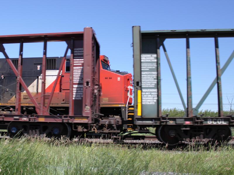 CN 2320 through a flatcar