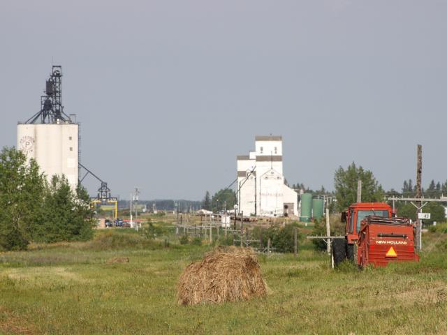 Indian Head grain elevators and tractor